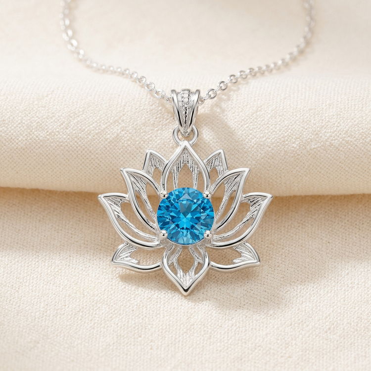 Silver lotus pendant with a Swarovski crystal