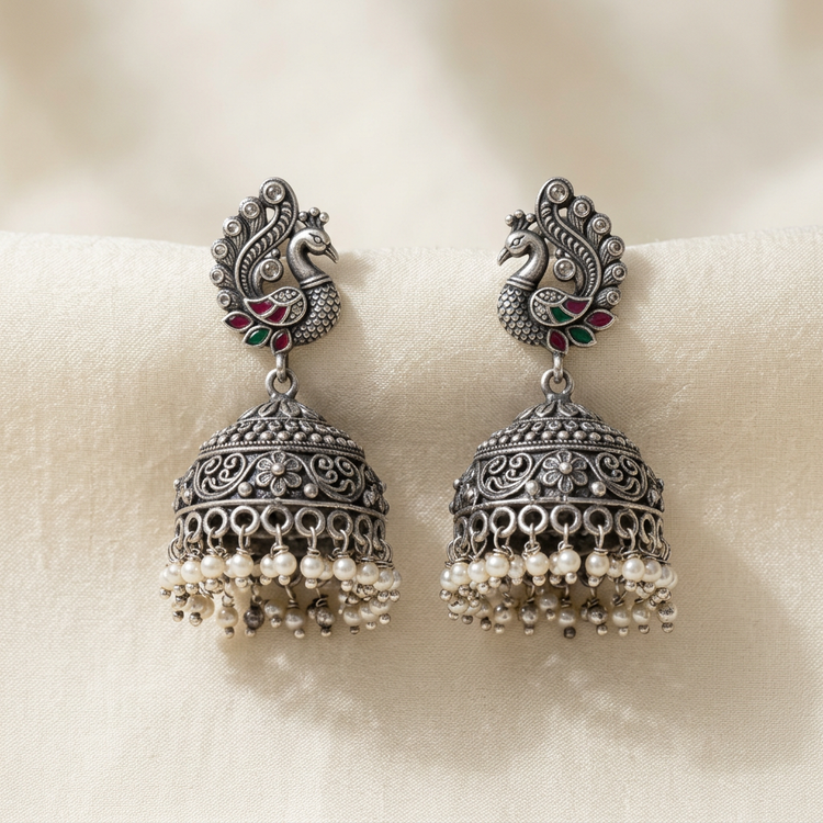 Oxidized silver peacock jhumka earrings with pearl drops